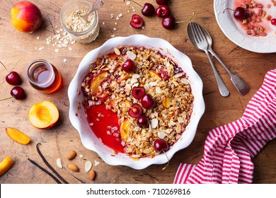 Peach And Berry Crumble In A Baking Dish. Top View.