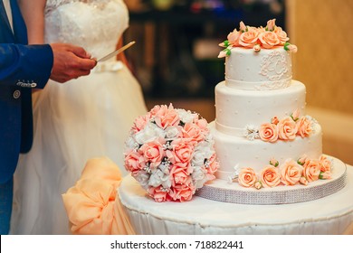 Peach Color Big Wedding Cake Stands At The Table, Wedding