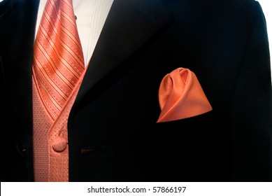 peach shirt black suit