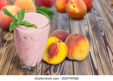 Peach Fruit Dessert In Glass Cup On Rustic Wooden Table With Fresh Peach Fruit,