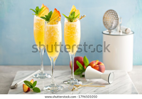 Peach mimosa or\
bellini cocktails for\
brunch