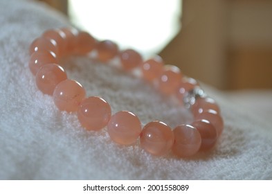 Peach Moonstone Bracelet 10 Mm.