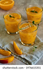 Peach Orange Smoothie In The Glasses