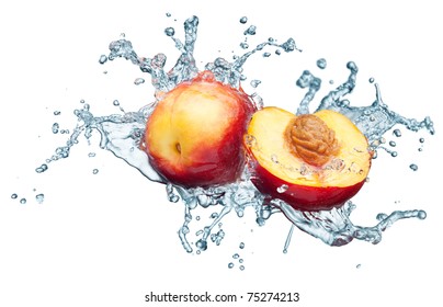Peach in spray of water. Juicy peach with splash on white background
