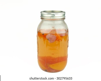 Peach, Strawberry Fruit Flavored Moonshine Alcohol In A Mason Jar