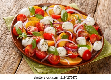 Peach Tomato Basil Salad Closeup On Wooden Rustic Background. Horizontal
