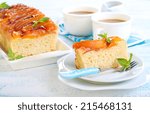 Peach upside down cake and coffee in cups