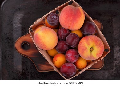 Peaches, Apricots And Plums In The Basket