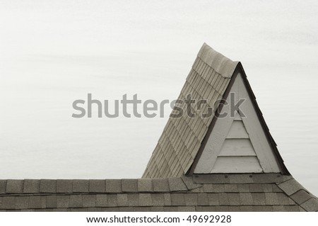 Similar – Roofs against the evening sky