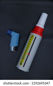 A Peak Flow Meter With An Inhaler Medicine. A Peak Flow Test Is Used In Asthma Treatment To Check The Treatment's Effectiveness.