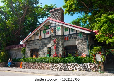 The Peak Loukout Restaurant, Located In Heritage House Close To The Victoria Peak, Hong Kong Island (Victoria Gap, China). Grade II Historic Building. Former Old Peak Café. Outdoor Shot. January 2020