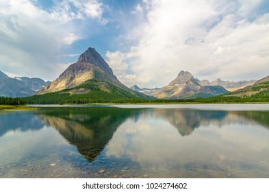 Peak Reflected In The Still Water Of Swift Current Lake