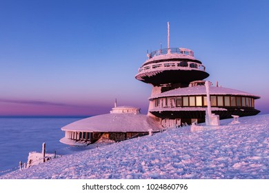 The peak of the Snezka Mountain in winter in the Krkonose Mountains. Snezka, Krkonose mouintain. Snezka hill after a sunset tinged in beautiful pastel colors view from Poland side. Czech Republic,