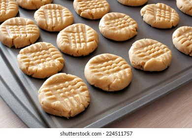 Peanut Butter Cookie Dough On A Baking Sheet Ready For The Oven