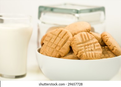 Peanut Butter Cookies On White With Milk