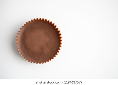 Peanut butter cup shot on a white background macro