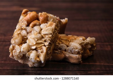 Peanut Butter Granola Bar Isolated On A Wooden Background