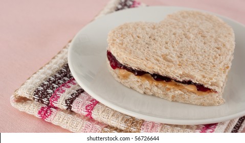 Peanut Butter and Jelly Sandwich on Wheat Bread - Powered by Shutterstock