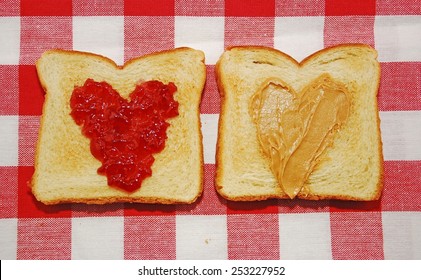 Peanut Butter And Jelly Spread In Heart Shapes On Toast