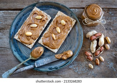 Peanut Butter On The Bread. Serving And Sharing Food With Table Top View. 