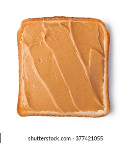 peanut butter on a slice of Toast. Isolated on a white background