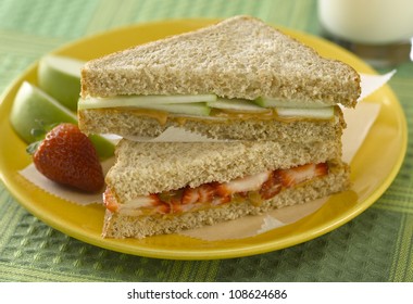 Peanut Butter Sandwich With Apple And Strawberries