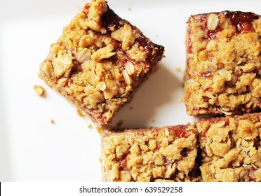 Peanut Butter and Strawberry Jelly Oat Bar Squares - Powered by Shutterstock