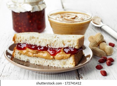 Peanut butter and strawberry jelly sandwich - Powered by Shutterstock