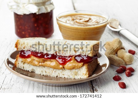 Peanut butter and strawberry jelly sandwich