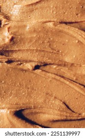 Peanut butter texture background. Creamy smooth brown nut spread. - Shutterstock ID 2251139997