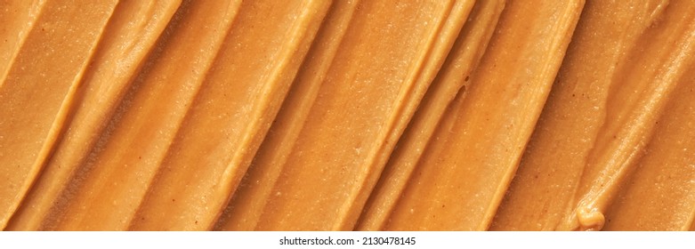 Peanut butter texture. Spread swirl. Organic keto food. Healthy creamy paste. Smooth closeup brown desert. Crunchy macro snack. Fat salt breakfast - Shutterstock ID 2130478145