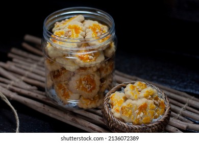 Peanut Cookies Inside Plastic Jar With Dark Background. Eid Hari Raya Cookies