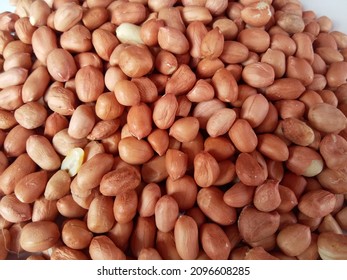The peanut, also known as the groundnut, goober, pindar or monkey nut, and taxonomically classified as Arachis hypogaea, is a legume crop grown mainly for its edible seeds.