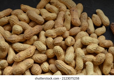 The peanuts, also known as the groundnut, goober, pindar or monkey nut. Commonly known as Legumes, beanor peas. Family Fabacear or Leguminosae. India.