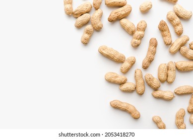 Peanuts on a white background. Peanuts in shells.