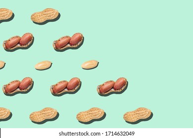 Peanuts pattern on light green background backdrop food nut texture