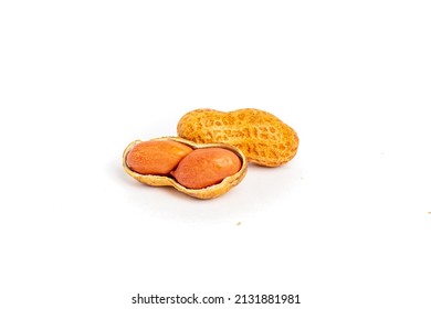 Peanuts In The Shell And A Broken Peanut On A White Background