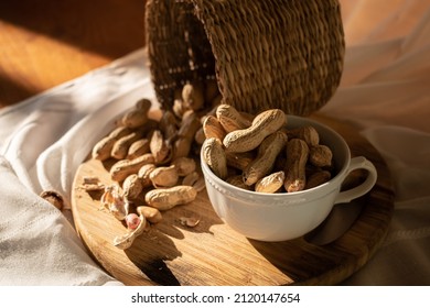 Peanuts In Shell With Wood Chopper