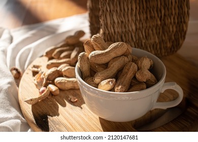 Peanuts In Shell With Wood Chopper