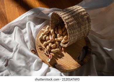 Peanuts In Shell With Wood Chopper