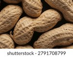 Peanuts with shells close up studio shot over