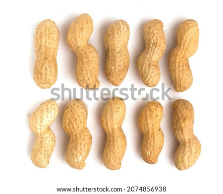 peanuts in shells on white background