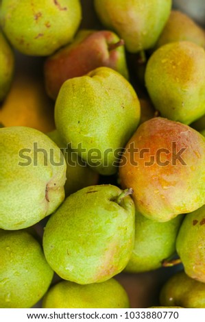 Pear texture: lots of pears collected in a bowl. Pear storage