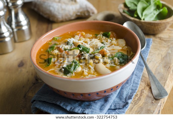 Pearl barley, butter bean and chickpea soup
topped with shaved
Parmesan