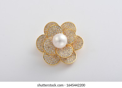 A Pearl Brooch In The Shape Of A Beautiful Flower