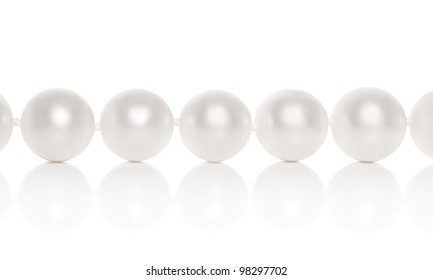 Pearl close-up on a white background with reflection