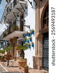 Pearl of Costa del Sol, colourful Marbella touristic town, view of old town with white houses, decoration, narrow strets and flowers, Andalusia, Spain