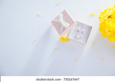 Pearl Earrings In The Gift Box With Yellow Flowers