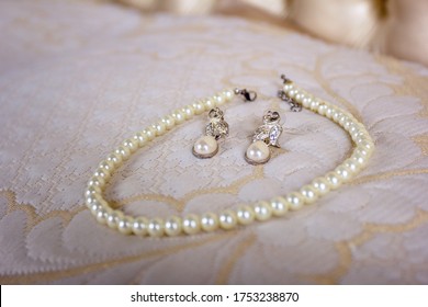 Pearl Earrings Lie On Bed Surrounded Stock Photo 1753238870 | Shutterstock