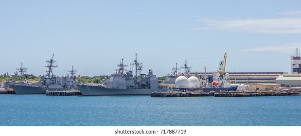 PEARL HARBOR, HAWAII - SEPTEMBER 19, 2012: Large Gray, U.S. Navy Aegis-class Guided Missile Frigates Are Moored Side By Side At The Pearl Harbor Naval Base Under A Blue Sky.